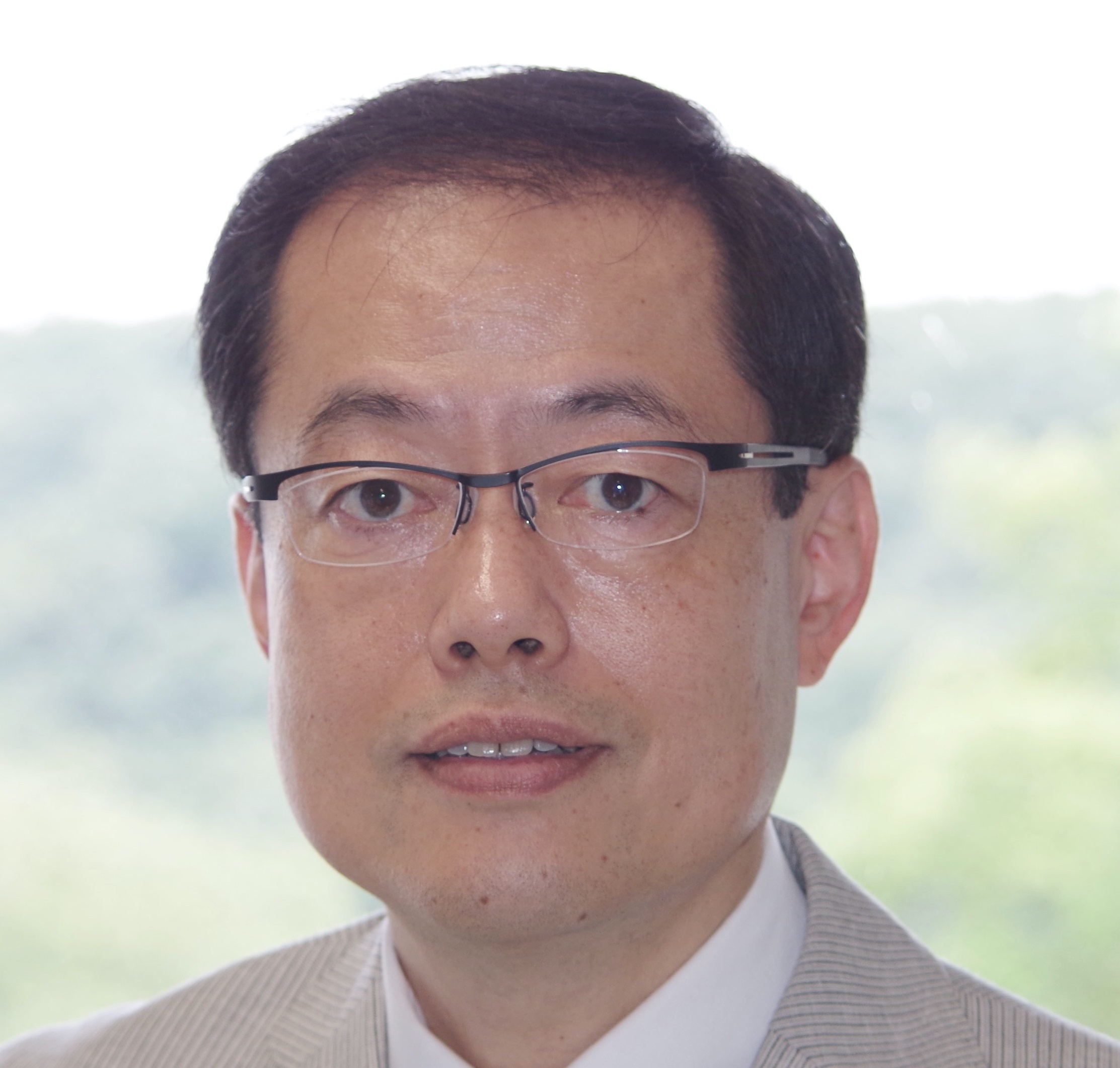倉片 憲治